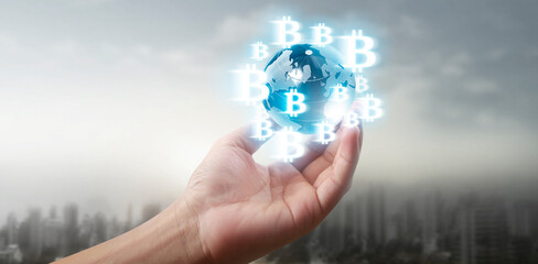 Hands showing bitcoin icon as virtual money digital