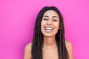 Happy mixed race young woman smiling on camera - Beautiful african girl - concept of happiness
