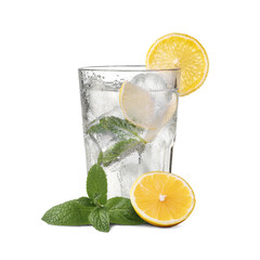 Glass of water with fresh lemons, leaves of mint and ice cubes isolated on white background....