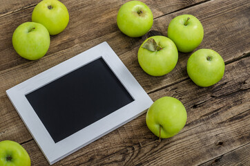 Aromatic green apples with white frame.