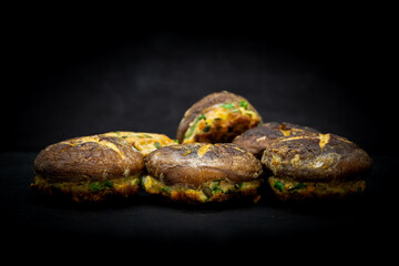 Korean food Pyogobeoseot-Jeon which is fried Shiitake mushroom with meatball