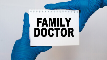 the doctor in gloves holds a card with the text FAMILY DOCTOR . white background. the medicine