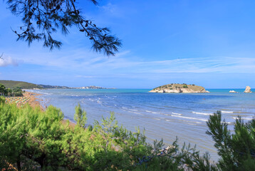 The most beautiful coasts of Apulia: bay of Vieste in  Gargano. In the foreground Portonuovo Beach...
