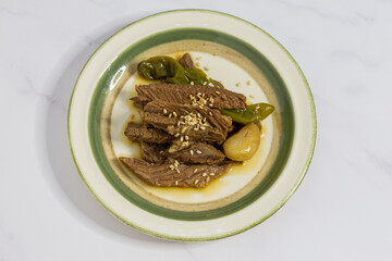 Jangjorim, beef braised in soy sauce with quail eggs