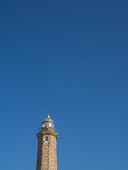 Obraz premium Estepona lighthouse with blue sky and copy space, on the Costa del Sol, Spain