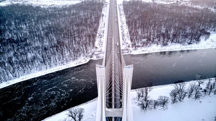 Fotobehang Winter drone photography of Redzinski Bridge over the Odra River in Wroclaw, Poland © mindea