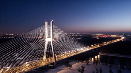 Winter drone photography of Redzinski Bridge over the Odra River in Wroclaw, Poland - obrazy, fototapety, plakaty