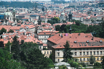 Naklejka premium Prague architecture Red roofs of houses View of red roofs from a height in Prague Prague Castle