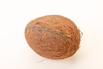 Tropical brown coconut over background