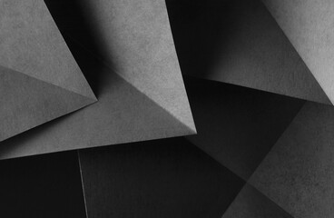 Geometric shapes made paper, dark background