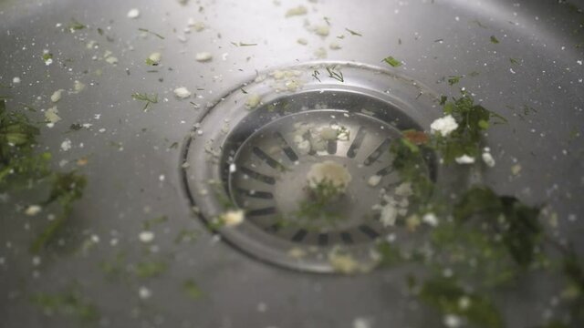 A clogged sink in the kitchen close-up