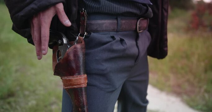 Cowboy Drawing Pistol In A Duel
