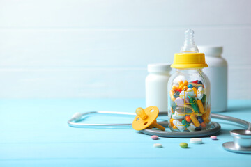  Pediatrics concept. Stethoscope and toy on a light background