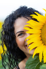 Portrait of a beautiful smiling dark-haired woman