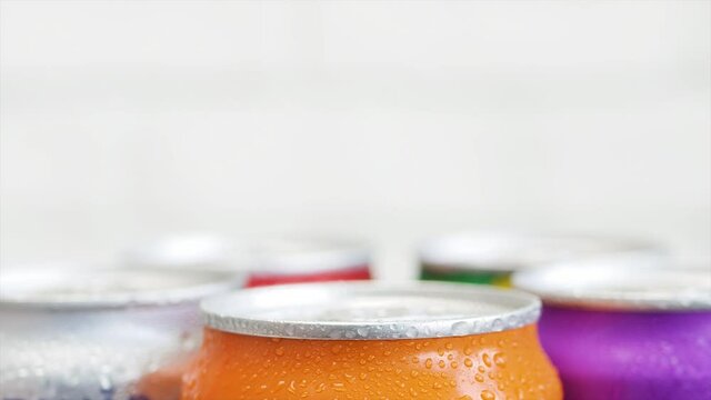 Shooting with Refreshing Pop Can Drinks. Various Cold, Sweet, and Carbonated Refreshing Drinks. 