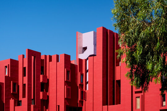 The modern apartment complex 'La Muralla Roja' by architect Ricardo Bofill in Calpe, Spain