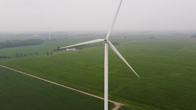 Continuous Rotation Of A Wind Turbine On The Field Of DTE Wind Farm In Ithaca, Michigan, USA. aerial, forward