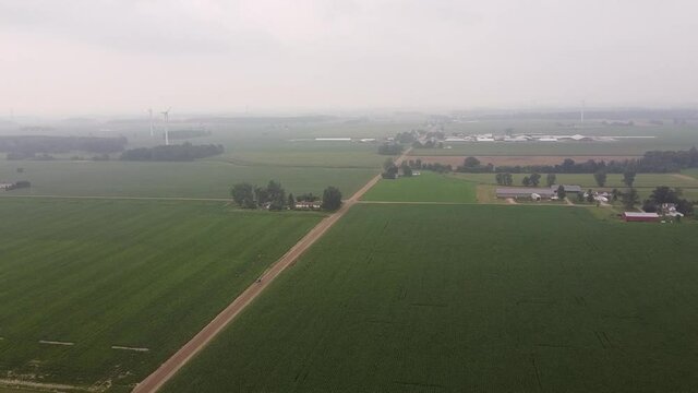 Panorama Of Windmills At Vast Farmland Of DTE Wind Farm, Ithaca City, Gratiot County, Michigan. aerial