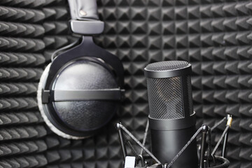 Microphone and headphones in studio. Sound engeenering