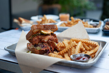Fried chicken sandwich with fries