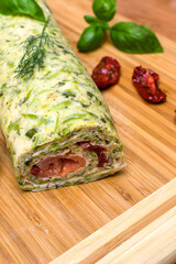 Zucchini roll with cream cheese and salmon