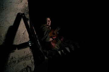 Stalker woman playing a guitar