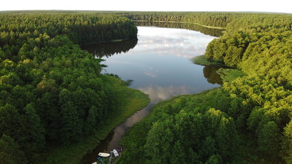 Poland, Masuria - small lake landscape taken by drone.
