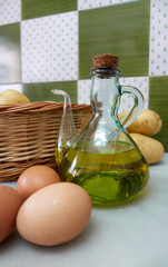 Oil eggs and potatoes to make a typical Spanish omelette