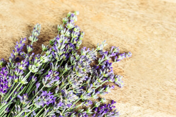 fresh lavender bouquet on wooden background, copy space