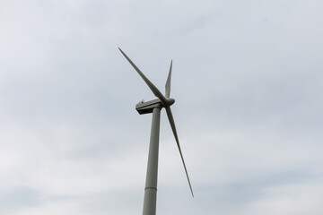 Wind turbine propeller. A wind generator, wind farm or wind turbine is a device for converting the kinetic energy of the wind flow into electrical energy.