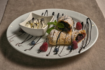 Cherry strudel with ice cream