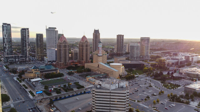 Aerial shot of downtown Mississauga during late afternoon before sunset on a summer day. City Centre, Celebration Square , city hall high-rise condominiums and Square One shopping mall.