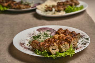 Chicken lula kebab with herbs and onions