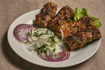 Beef lula kebab with herbs and onions