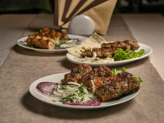 Beef lula kebab with herbs and onions