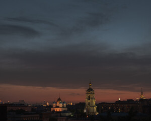 Fototapeta na wymiar Night cityscape with Novospassky monastery and bell tower