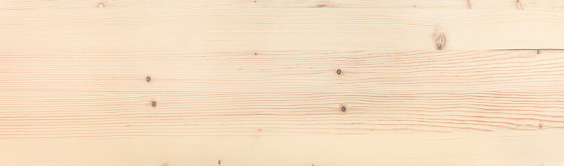 Background texture of natural spruce board with knots. Top view background panoramic banner