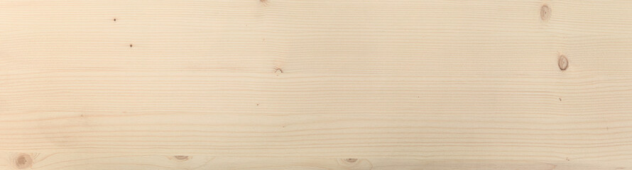 Background texture of natural spruce board with knots. Top view background panoramic banner