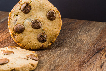 Chocolate cookies on wooden table. Close-up. Selective focus