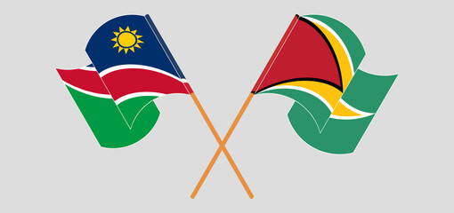 Crossed and waving flags of Namibia and Guyana