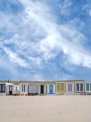 Fototapeta na wymiar Beach houses on the beach of Wijk aan Zee, Noord-Holland Province, The Netherlands