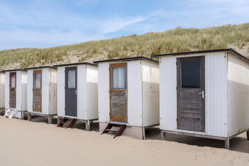 Fototapeta na wymiar Beach houses on the beach of Wijk aan Zee, Noord-Holland Province, The Netherlands