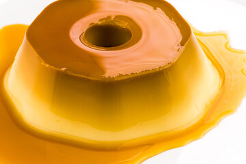 Milk Pudding or Pudim de leite. Traditional brazilian dessert with caramel sauce isolated on a...