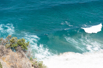 waves crashing on rocks