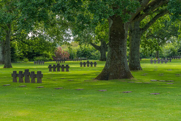 Fototapeta na wymiar La Cambe, France - 08 03 2021: Normandy German military cemetery and Memorial and the black crosses