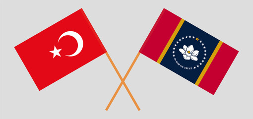 Crossed flags of Turkey and the State of Mississippi. Official colors. Correct proportion