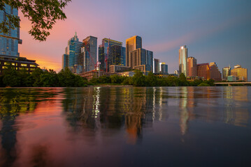 Fototapeta na wymiar Downtown Skyline of Austin, Texas in USA. Austin Sunset on the Colorado River. Night sunset city.