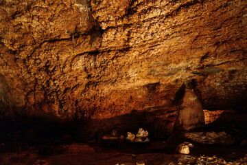 Koneprusy, Czech Republic, 24 July 2021: Natural dripstone rock formations with stone decoration in Koneprusy limestone caves in Bohemian Karst, underground world with stalagmite and stalactite halls