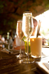Cold beverages on a party in sunset light