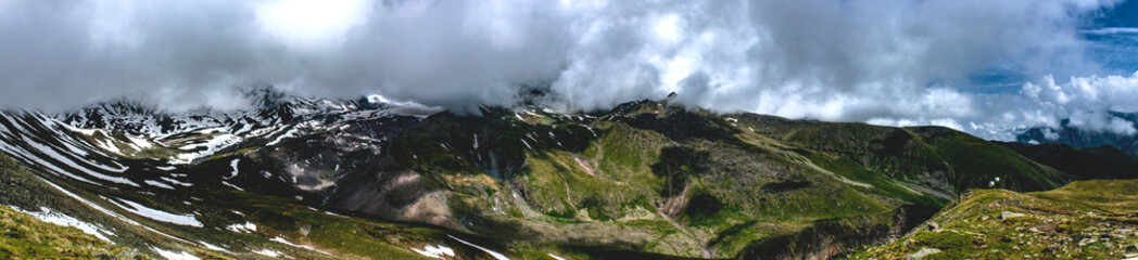 Fototapeta na wymiar mountain ranges near peak Kazbegi, Georgia 2019